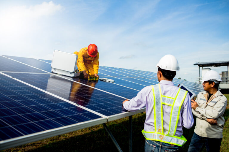 a solar contractor doing solar panel maintenance